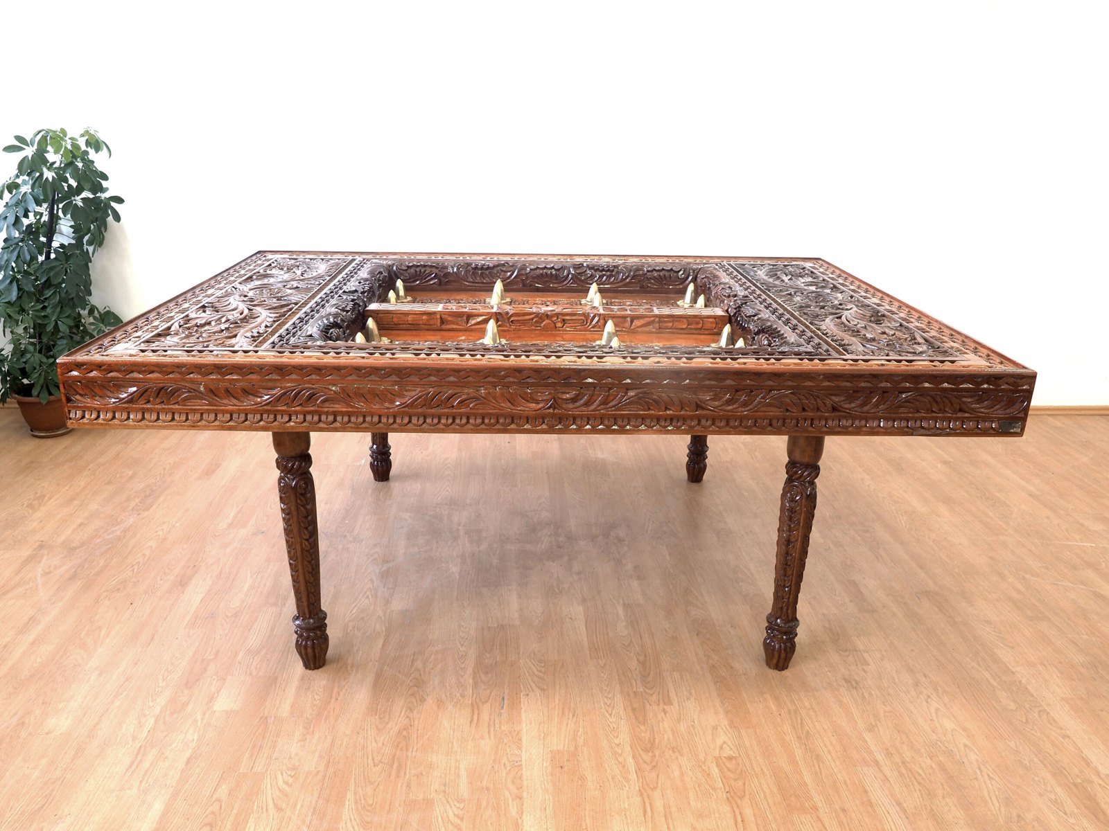 Zanzibar Dark Mongongo Dining Table — hand-carved mongongo wood, one of one, carved at Mwenge, Dar es Salaam, Tanzania