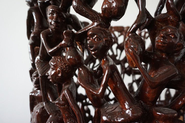 Makonde Carved Coffee Table with Glass Top – Luxury Hand-Carved Tribal Art for Dubai Interiors