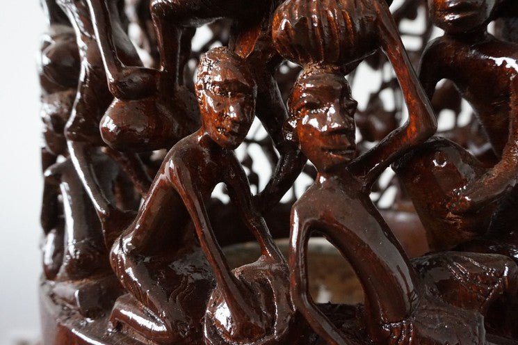Makonde Carved Coffee Table with Glass Top – Luxury Hand-Carved Tribal Art for Dubai Interiors