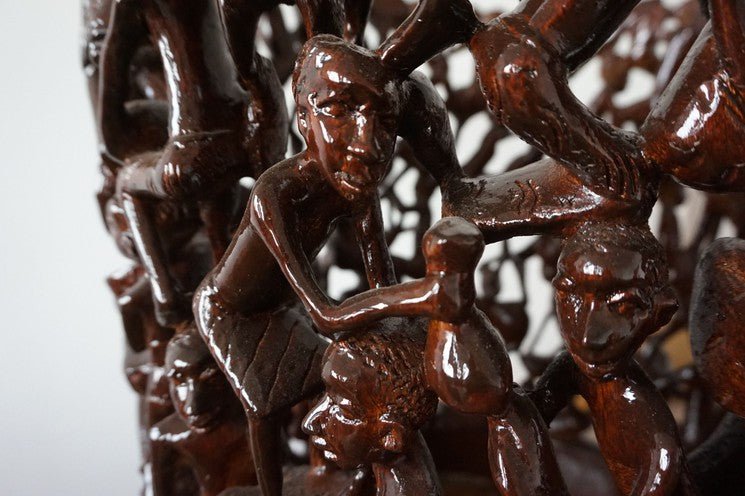 Makonde Carved Coffee Table with Glass Top – Luxury Hand-Carved Tribal Art for Dubai Interiors