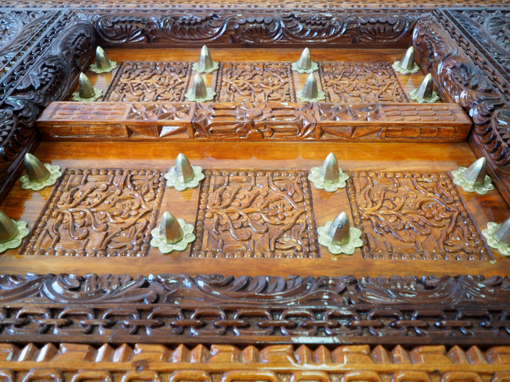Zanzibar Dark Mongongo Dining Table – Luxury Hand-Carved Art for Dubai Interiors