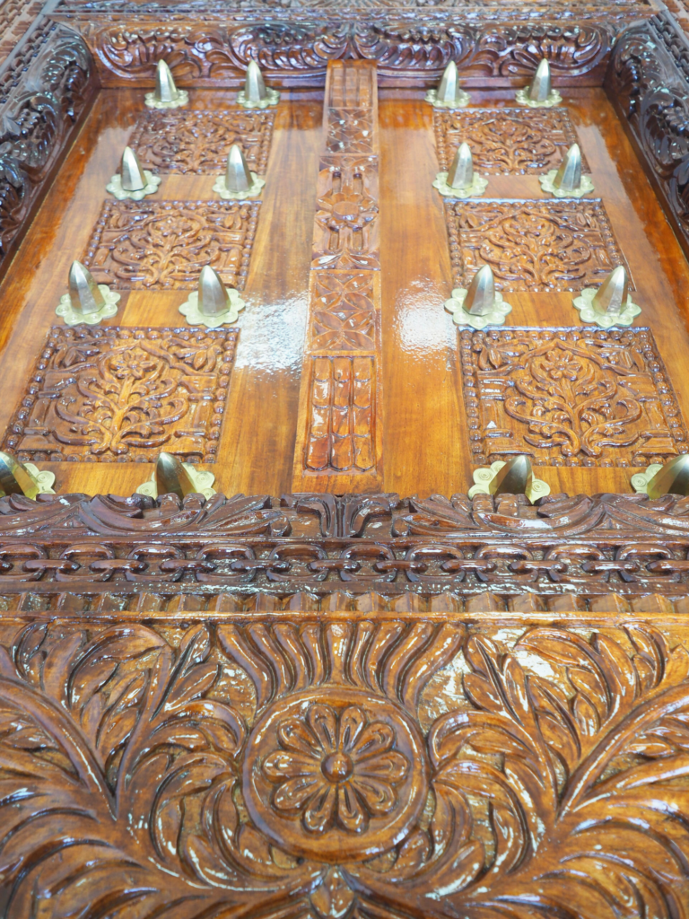 Zanzibar Dark Mongongo Dining Table – Luxury Hand-Carved Art for Dubai Interiors