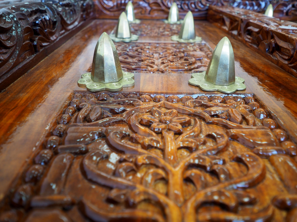 Zanzibar Dark Mongongo Dining Table – Luxury Hand-Carved Art for Dubai Interiors