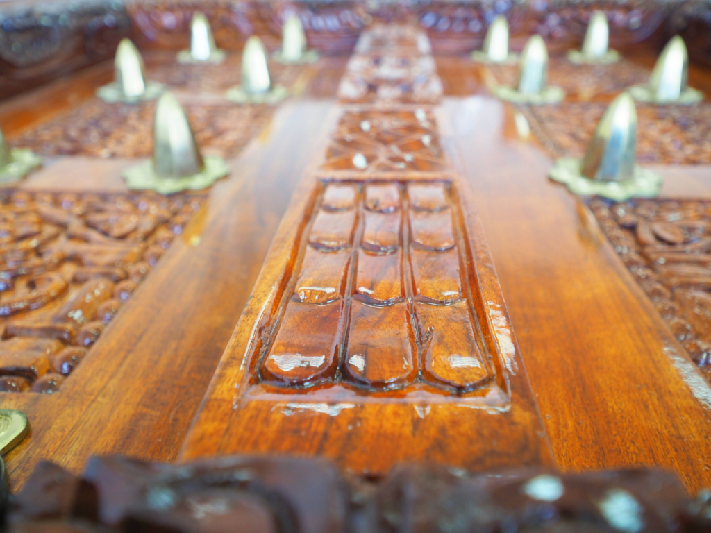 Zanzibar Dark Mongongo Dining Table – Luxury Hand-Carved Art for Dubai Interiors