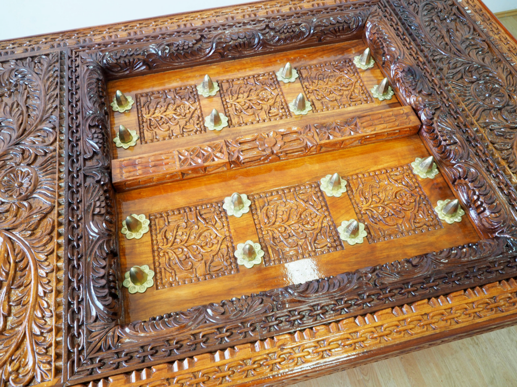 Zanzibar Dark Mongongo Dining Table – Luxury Hand-Carved Art for Dubai Interiors