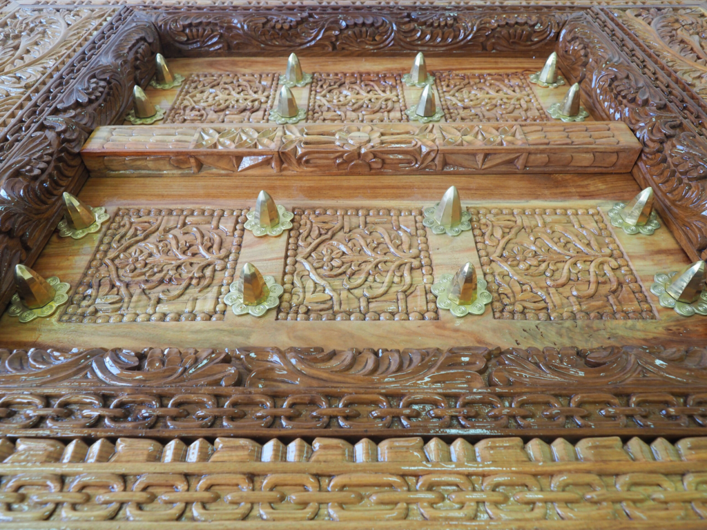 Zanzibar Mongongo Wood Dining Table – Luxury Hand-Carved Art Furniture for Dubai Interiors